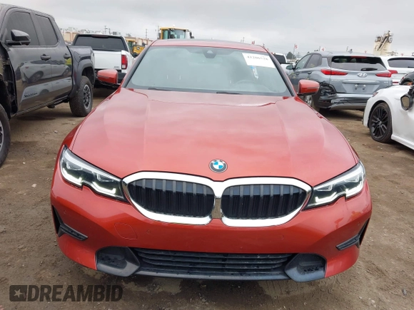 2019 BMW 3 Series 330i xDrive with VIN WBA5R7C50KFH28767, listed as a IAAI auction lot 42206528 with 52,529 mi miles and . Bid and sale history available at DreamBid. Image 13.