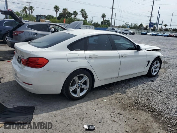2015 BMW 4 Series 428i with VIN WBA4A9C59FGL85999, listed as a Copart auction lot 56275455 with 105,961 mi miles and Salvage title. Bid and sale history available at DreamBid. Image 3.