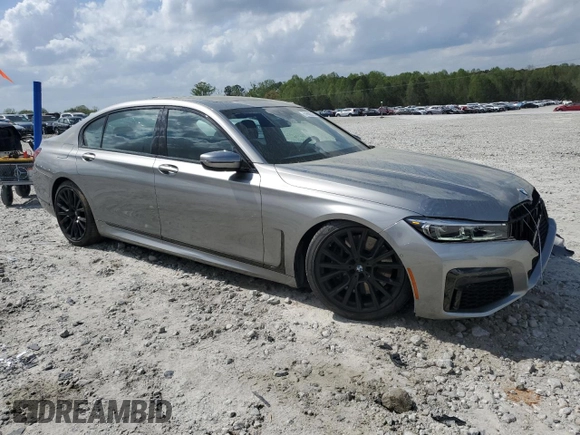 2022 BMW 7 Series 740i with VIN WBA7T2C09NCJ48292, listed as a Copart auction lot 51650315 with 21,585 mi miles and Salvage Title. Bid and sale history available at carsss.com. Image 4.