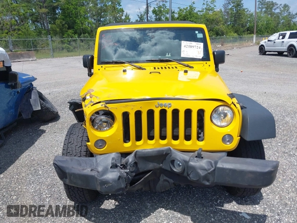 2015 Jeep Wrangler Unlimited Willys Wheeler with VIN 1C4BJWDG2FL643375, listed as a IAAI auction lot 42109724 with 112,357 mi miles and . Bid and sale history available at DreamBid. Image 12.