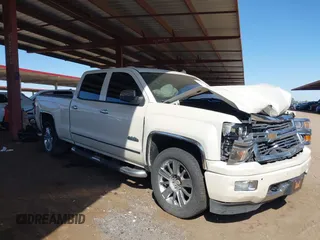 2014 Chevrolet Silverado 1500 High Country with VIN 3GCUKTEC2EG269961, listed as a IAAI auction lot 42054082 with 165,209 mi miles and . Bid and sale history available at DreamBid. Image 1.