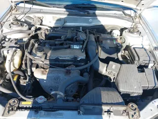 2002 Mitsubishi Galant ES with VIN 4A3AA46G52E074076, listed as a IAAI auction lot 41302075 with 174,960 mi miles. Bid and sale history available at carsss.com. Image 10.