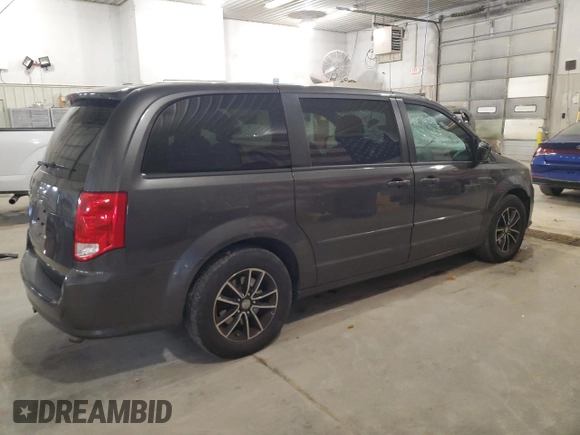 2015 Dodge Grand Caravan SE with VIN 2C4RDGBG6FR668740, listed as a Copart auction lot 50211885 with 129,695 mi miles and Salvage Title. Bid and sale history available at DreamBid. Image 3.