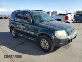 2000 Honda CR-V LX with VIN JHLRD2842YC012081, listed as a Copart auction lot 76782424 with 194,361 mi miles and Salvage Title. Bid and sale history available at carsss.com. Image 4.