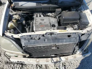 2000 Lexus RX 300 with VIN JT6GF10U1Y0064850, listed as a Copart auction lot 77003934 with 0 mi miles and Salvage Title. Bid and sale history available at carsss.com. Image 13.