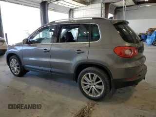 2011 Volkswagen Tiguan SEL z VIN WVGBV7AXXBW559663, wystawiony jako Copart lot #52307905 z przebiegiem 125 263 mil mil oraz Szkoda całkowita • Salvage title. Historia ofert i sprzedaży dostępna na DreamBid. Obrazek 2.
