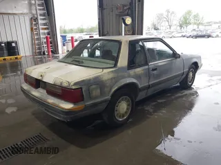 1989 Ford Mustang with VIN 1FABP40A3KF188992, listed as a IAAI auction lot 42076796 with 43,676 mi miles and . Bid and sale history available at DreamBid. Image 4.