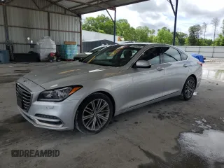 2018 Genesis G80 3.8L z VIN KMHGN4JE3JU251361, wystawiony jako Copart lot #56556565 z przebiegiem 58 479 mil mil oraz Tytuł czysty. Historia ofert i sprzedaży dostępna na DreamBid. Obrazek 1.