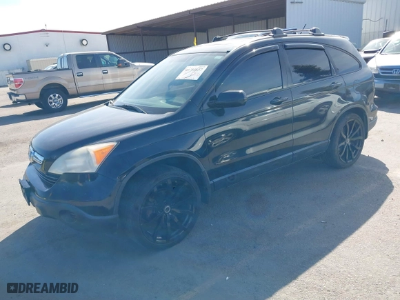 2007 Honda CR-V EX-L with VIN JHLRE48747C046122, listed as a IAAI auction lot 41751657 with 156,007 mi miles. Bid and sale history available at carsss.com. Image 2.
