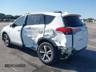 2018 Toyota RAV4 XLE with VIN JTMWFREV3JJ753454, listed as a IAAI auction lot 41775159 with 75,078 mi miles. Bid and sale history available at carsss.com. Image 6.