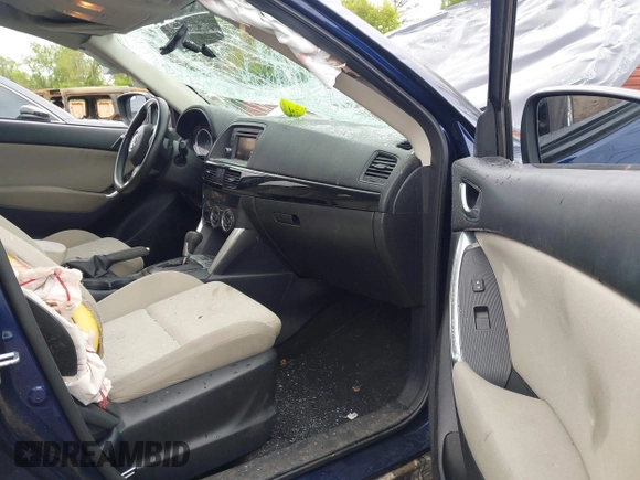 2013 Mazda CX-5 Sport with VIN JM3KE2BE1D0160254, listed as a IAAI auction lot 42256555 with 136,476 mi miles and . Bid and sale history available at DreamBid. Image 5.