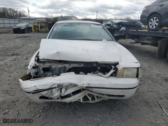 1999 Ford Crown Victoria Police Pkg with VIN 2FAFP71W6XX107511, listed as a Copart auction lot 44328975 with 188,433 mi miles and Salvage Title. Bid and sale history available at carsss.com. Image 5.