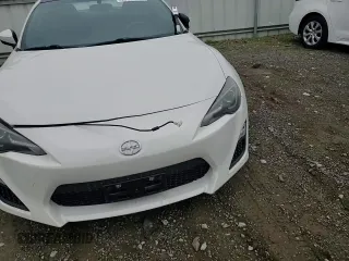 2015 Scion FR-S z VIN JF1ZNAA14F8703283, wystawiony jako Copart lot #50995885 z przebiegiem 101 033 mil mil oraz Szkoda całkowita • Salvage title. Historia ofert i sprzedaży dostępna na DreamBid. Obrazek 11.