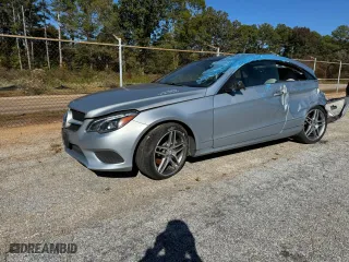 2015 Mercedes-Benz E-Class E 400 with VIN WDDKJ6FB2FF307294, listed as a Copart auction lot 77882794 with 82,173 mi miles and Salvage Title. Bid and sale history available at carsss.com. Image 2.