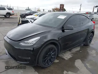 2022 Tesla Model Y Long Range z VIN 7SAYGDEE0NF508958, wystawiony jako IAAI lot #42191819 z przebiegiem 60 880 mil mil oraz . Historia ofert i sprzedaży dostępna na DreamBid. Obrazek 2.