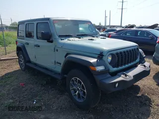 2024 Jeep Wrangler Willys with VIN 1C4PJXDG6RW287656, listed as a IAAI auction lot 41939426 with 6,121 mi miles and . Bid and sale history available at carsss.com. Image 1.