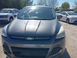 2014 Ford Escape SE with VIN 1FMCU9G99EUB13371, listed as a IAAI auction lot 42167417 with 140,145 mi miles and . Bid and sale history available at DreamBid. Image 12.