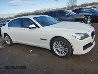 2015 BMW 7 Series 740Li xDrive with VIN WBAYF4C58FGS99427, listed as a Copart auction lot 84991474 with 83,008 mi miles and Salvage Title. Bid and sale history available at carsss.com. Image 4.