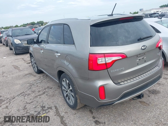 2014 Kia Sorento SX Limited with VIN 5XYKW4A73EG503792, listed as a IAAI auction lot 42684390 with 129,021 mi miles and . Bid and sale history available at DreamBid. Image 3.