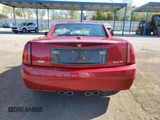 2004 Cadillac XLR z VIN 1G6YV34A345600127, wystawiony jako Copart lot #68859774 z przebiegiem 40 727 mil mil oraz Szkody całkowita. Historia ofert i sprzedaży dostępna na DreamBid. Obrazek 6.