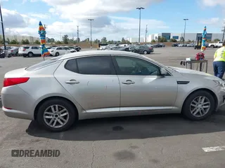 2013 Kia Optima LX with VIN KNAGM4A71D5414691, listed as a IAAI auction lot 41916576 with 245,851 mi miles. Bid and sale history available at carsss.com. Image 13.