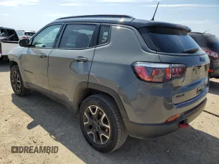 2020 Jeep Compass Trailhawk z VIN 3C4NJDDB7LT118589, wystawiony jako Copart lot #55264435 z przebiegiem 96 330 mil mil oraz Szkoda całkowita • Salvage title. Historia ofert i sprzedaży dostępna na DreamBid. Obrazek 2.