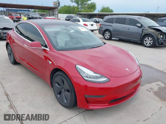 2018 Tesla Model 3 Long Range Battery z VIN 5YJ3E1EB8JF096249, wystawiony jako IAAI lot #42150031 z przebiegiem 70 981 mil mil oraz . Historia ofert i sprzedaży dostępna na DreamBid. Obrazek 1.