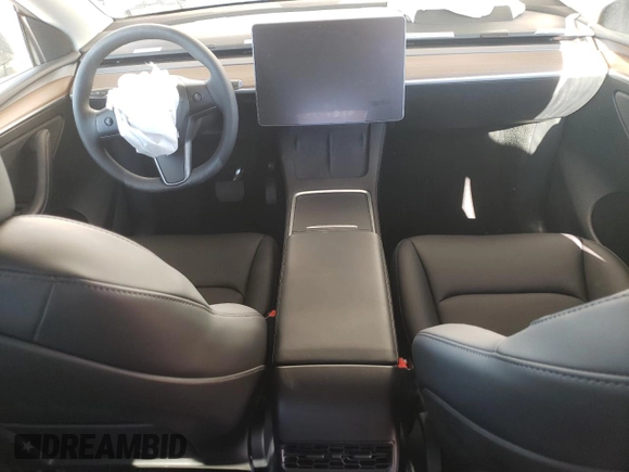 2024 Tesla Model Y Long Range with VIN 7SAYGDEE4RF127409, listed as a Copart auction lot 84274794 with 14,246 mi miles and Salvage title. Bid and sale history available at DreamBid. Image 8.