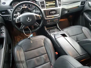 2014 Mercedes-Benz M 550 with VIN 4JGDA7DB3EA435594, listed as a Copart auction lot 87638055 with 227,256 mi miles and Salvage title. Bid and sale history available at DreamBid. Image 8.