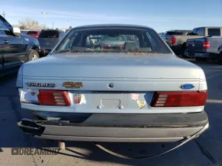 1991 Ford Taurus z VIN 1FACP52U3MA237495, wystawiony jako Copart lot #82519194 z przebiegiem 41 048 mil mil oraz Czysty tytuł • Clean title. Historia ofert i sprzedaży dostępna na DreamBid. Obrazek 6.