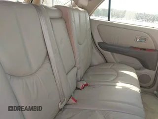 2002 Lexus RX 300 z VIN JTJGF10U920129117, wystawiony jako IAAI lot #41898105 z przebiegiem 185 752 mil mil oraz . Historia ofert i sprzedaży dostępna na DreamBid. Obrazek 8.
