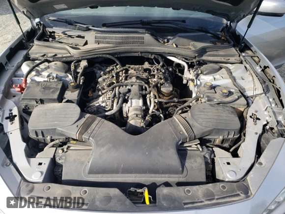 2014 Maserati Ghibli z VIN ZAM57XSA3E1105712, wystawiony jako Copart lot #47751435 z przebiegiem 88 432 mil mil oraz Szkoda całkowita • Salvage title. Historia ofert i sprzedaży dostępna na DreamBid. Obrazek 11.