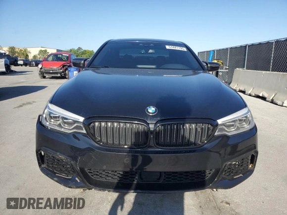 2018 BMW 5 Series M550i xDrive with VIN WBAJB9C52JB035913, listed as a Copart auction lot 51441195 with 42,205 mi miles and Salvage Title. Bid and sale history available at carsss.com. Image 5.