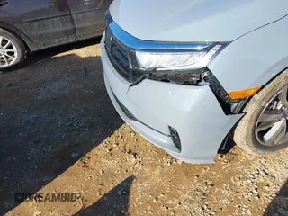 2023 Honda Odyssey Touring with VIN 5FNRL6H84PB005208, listed as a IAAI auction lot 41374452 with 60,288 mi miles and . Bid and sale history available at DreamBid. Image 20.