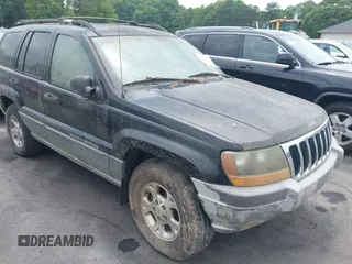 1999 Jeep Grand Cherokee Laredo with VIN 1J4GW58S1XC525412, listed as a IAAI auction lot 42441298 with 200,928 mi miles and . Bid and sale history available at DreamBid. Image 1.