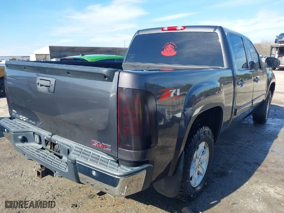 2011 GMC Sierra 1500 SLE with VIN 3GTP1VE06BG207203, listed as a IAAI auction lot 41495972 with 151,239 mi miles. Bid and sale history available at carsss.com. Image 4.