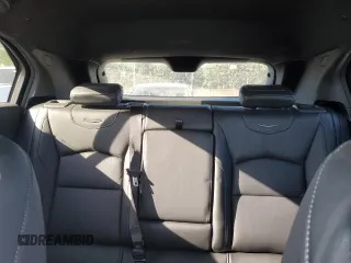 2021 Cadillac XT4 FWD Luxury z VIN 1GYAZAR49MF081955, wystawiony jako Copart lot #76611074 z przebiegiem 34 635 mil mil oraz Szkoda całkowita • Salvage title. Historia ofert i sprzedaży dostępna na DreamBid. Obrazek 10.