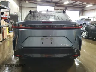 2023 Lexus RZ 450e Premium z VIN JTJAAAAB0PA004297, wystawiony jako Copart lot #82275023 z przebiegiem 6684 mil mil oraz . Historia ofert i sprzedaży dostępna na DreamBid. Obrazek 6.