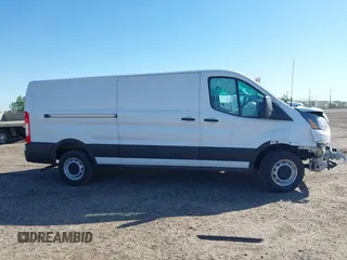 2023 Ford Transit Cargo with VIN 1FTYE1Y82PKA84762, listed as a IAAI auction lot 41718720 with 21,029 mi miles and . Bid and sale history available at DreamBid. Image 13.