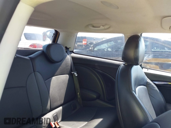 2009 MINI Hardtop S with VIN WMWMF73579TW86675, listed as a IAAI auction lot 42459385 with 129,264 mi miles and . Bid and sale history available at DreamBid. Image 8.