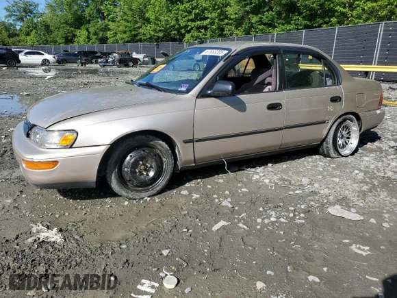 1995 Toyota Corolla DX with VIN 2T1AE09B0SC098739, listed as a Copart auction lot 57653205 with 154,226 mi miles and Salvage title. Bid and sale history available at DreamBid. Image 1.