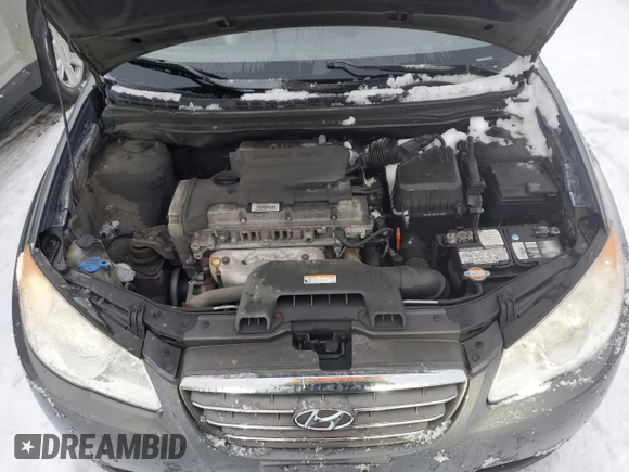 2009 Hyundai Elantra z VIN KMHDT45D49U740390, wystawiony jako Copart lot #86060014 z przebiegiem 194 162 mil mil oraz Szkoda całkowita • Salvage title. Historia ofert i sprzedaży dostępna na DreamBid. Obrazek 11.