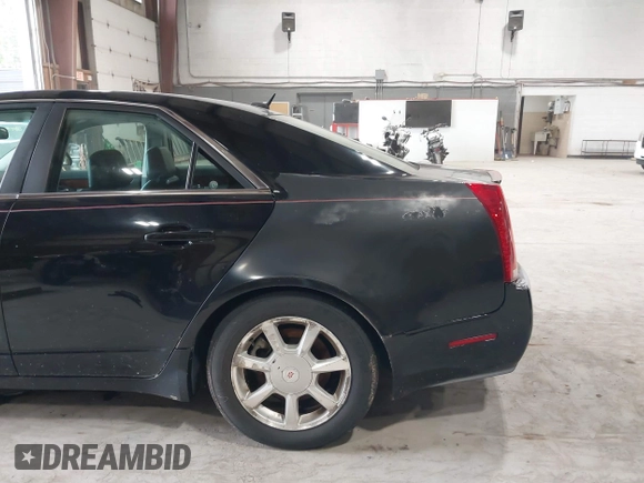 2008 Cadillac CTS AWD z VIN 1G6DH577780191604, wystawiony jako IAAI lot #42506015 z przebiegiem 137 958 mil mil oraz . Historia ofert i sprzedaży dostępna na DreamBid. Obrazek 6.