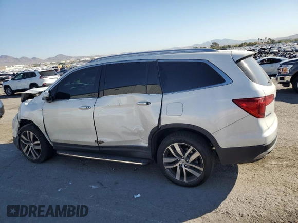 2017 Honda Pilot Touring with VIN 5FNYF6H92HB092491, listed as a Copart auction lot 76141434 with 56,002 mi miles and Salvage Title. Bid and sale history available at carsss.com. Image 2.