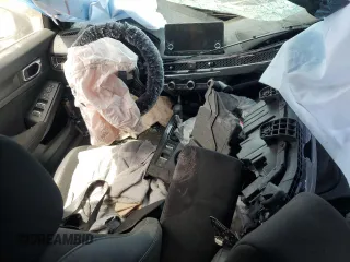 2022 Honda Civic Sport z VIN 2HGFE2F54NH515517, wystawiony jako Copart lot #54695585 z przebiegiem Nie podano mil oraz Szkoda całkowita • Salvage title. Historia ofert i sprzedaży dostępna na DreamBid. Obrazek 8.