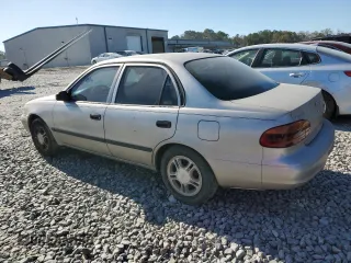 2000 Chevrolet Prizm z VIN 1Y1SK5284YZ407566, wystawiony jako Copart lot #86148464 z przebiegiem 193 844 mil mil oraz Szkoda całkowita • Salvage title. Historia ofert i sprzedaży dostępna na DreamBid. Obrazek 2.