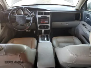2007 Dodge Magnum R/T z VIN 2D4GV57257H656658, wystawiony jako Copart lot #49389545 z przebiegiem 221 395 mil mil oraz Szkody całkowita. Historia ofert i sprzedaży dostępna na DreamBid. Obrazek 8.