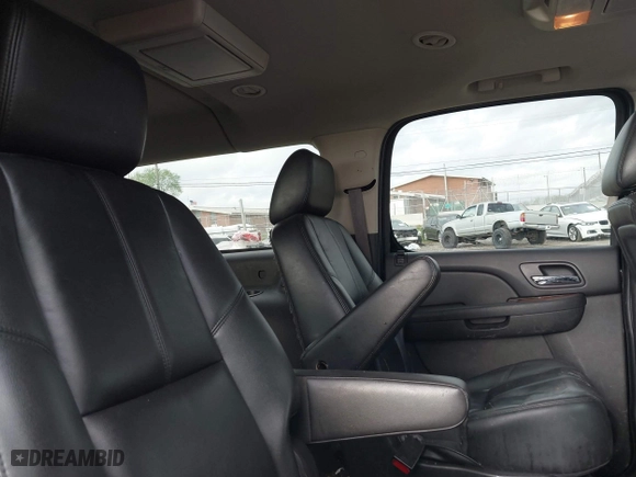 2013 Chevrolet Suburban LT with VIN 1GNSKJE70DR284785, listed as a IAAI auction lot 41838484 with 113,696 mi miles. Bid and sale history available at carsss.com. Image 8.