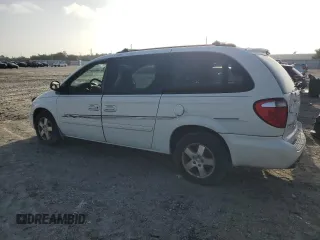 2005 Dodge Caravan SXT with VIN 2D4GP44L45R585381, listed as a Copart auction lot 66082085 with 195,700 mi miles and Salvage title. Bid and sale history available at DreamBid. Image 2.
