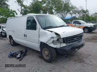 2005 Ford Econoline Cargo with VIN 1FTRE14W75HA41442, listed as a IAAI auction lot 42438411 with 197,241 mi miles and . Bid and sale history available at DreamBid. Image 12.